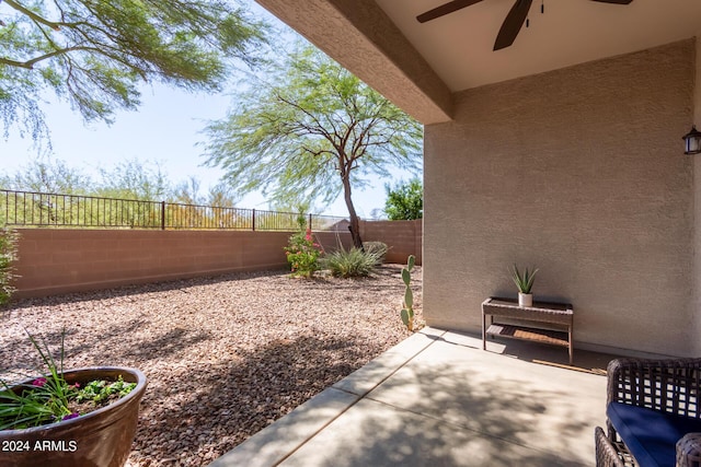 view of patio / terrace featuring ceiling fan