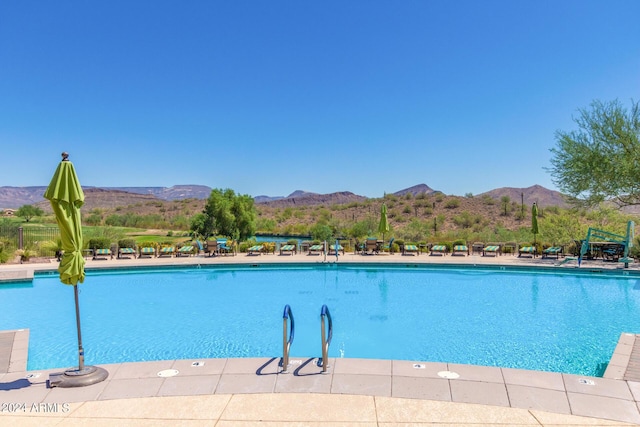 view of pool with a mountain view