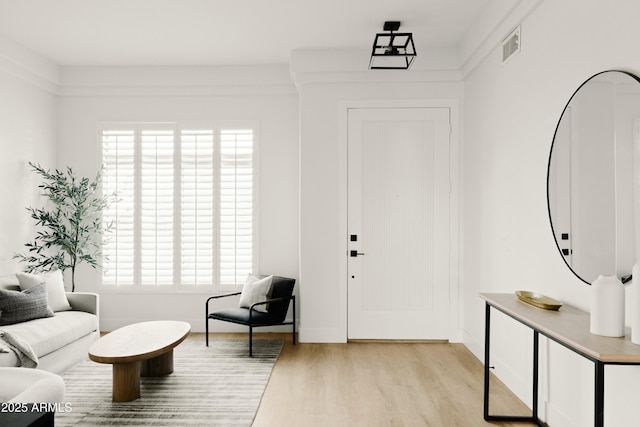 entrance foyer with light wood-type flooring