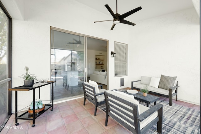 view of patio with ceiling fan and an outdoor hangout area