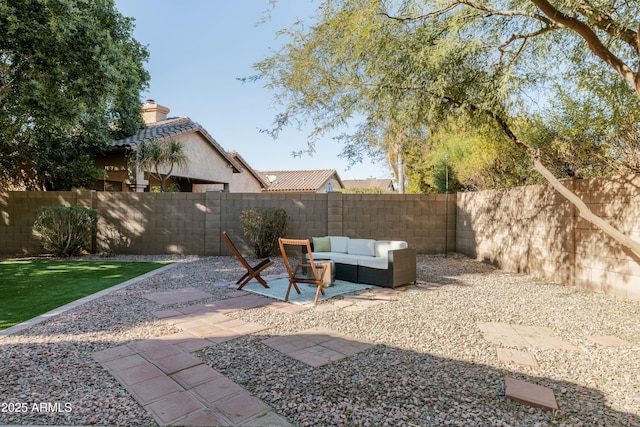 view of yard featuring an outdoor living space and a patio area