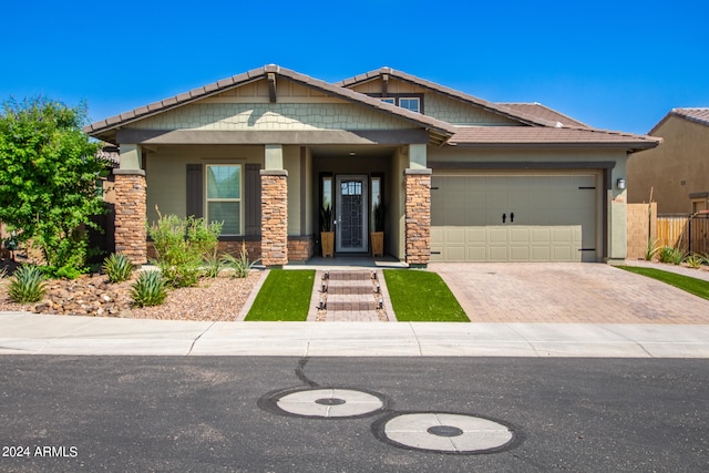 craftsman-style home with a garage