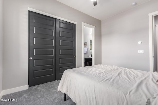 bedroom featuring ceiling fan, a closet, carpet floors, and connected bathroom