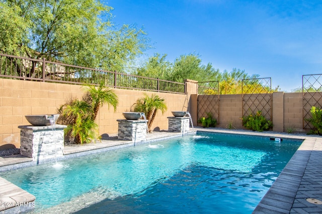 view of pool featuring pool water feature