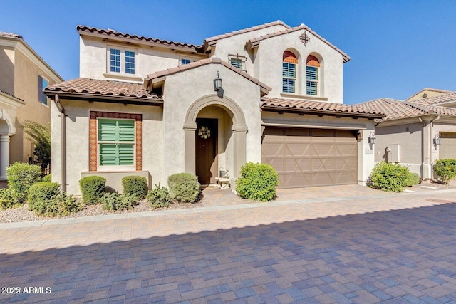 1952 W Yellowstone Way, Chandler, AZ 85248 - mediterranean / spanish-style house with stucco siding, a garage, a tile roof, and driveway