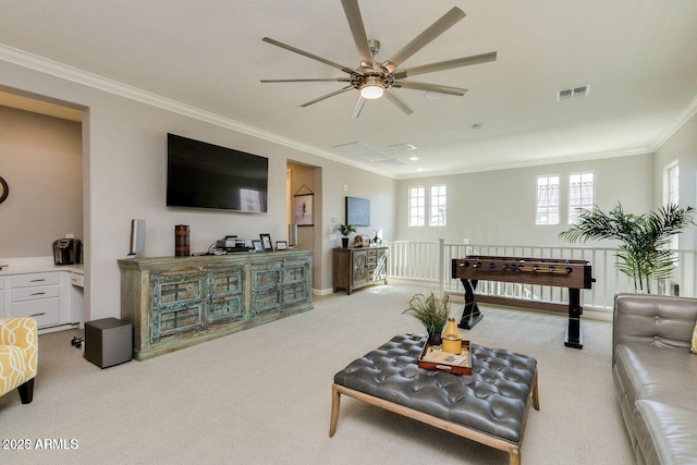 1952 W Yellowstone Way, Chandler, AZ 85248 - living area with crown molding, ceiling fan, and light carpet