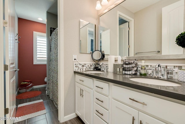 1952 W Yellowstone Way, Chandler, AZ 85248 - full bathroom with double vanity, toilet, and baseboards