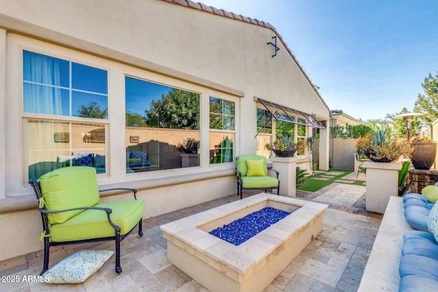 1952 W Yellowstone Way, Chandler, AZ 85248 - view of patio / terrace featuring a fire pit and fence