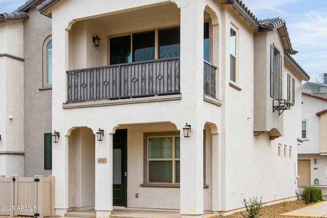 4063 E Amoroso Dr, Gilbert, AZ 85296 - multi unit property with a balcony, a tiled roof, and stucco siding
