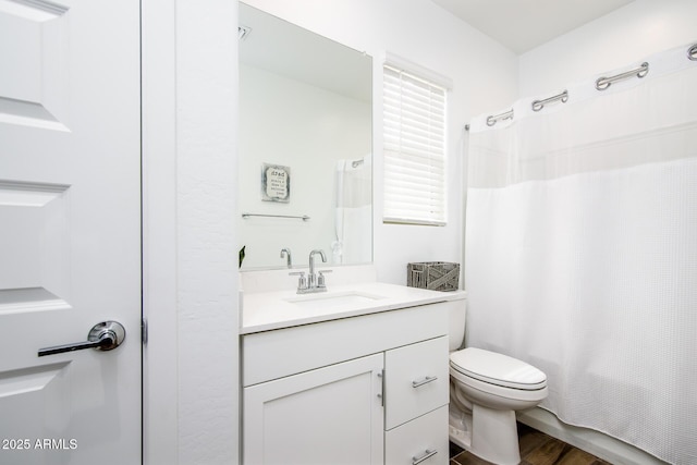 4063 E Amoroso Dr, Gilbert, AZ 85296 - full bath featuring vanity, toilet, wood finished floors, and a shower with curtain