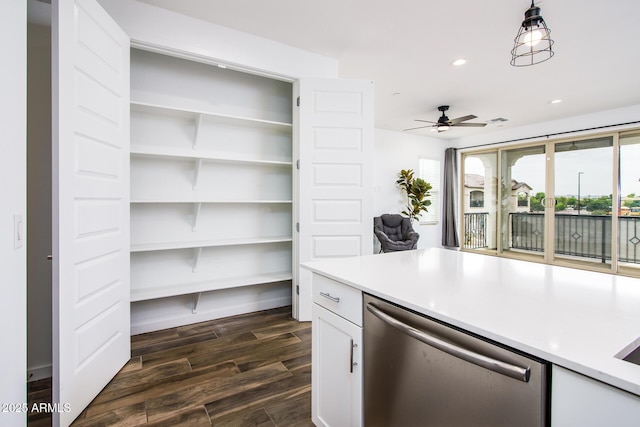 4063 E Amoroso Dr, Gilbert, AZ 85296 - kitchen with dishwasher, white cabinetry, dark wood finished floors, ceiling fan, and light countertops