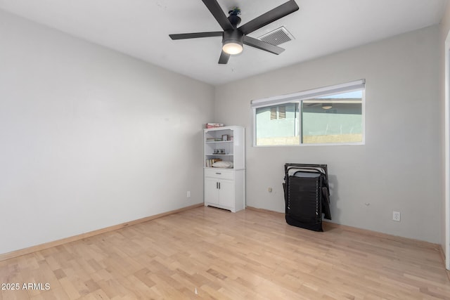 interior space featuring light hardwood / wood-style floors and ceiling fan