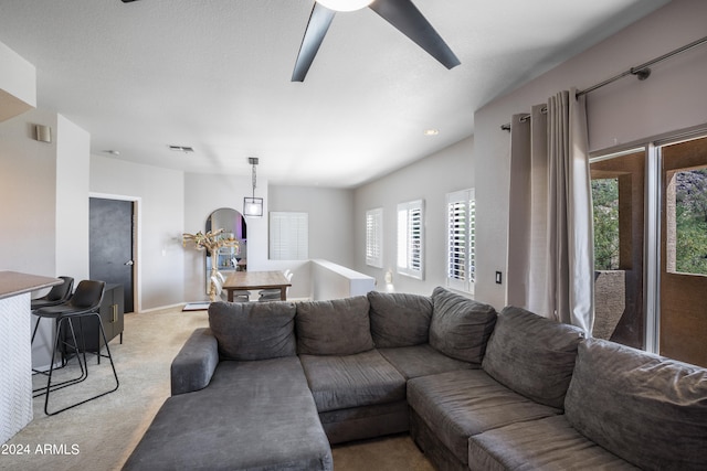 living room featuring light carpet