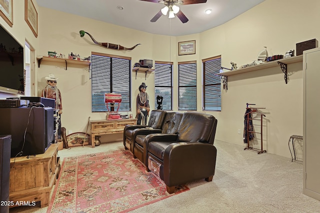 living room featuring ceiling fan and light carpet