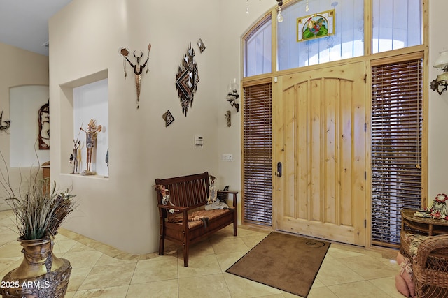 entrance foyer featuring light tile patterned floors