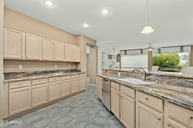 kitchen with dishwasher, decorative light fixtures, light brown cabinetry, sink, and ceiling fan