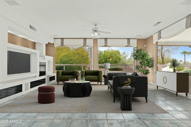 tiled living room with ceiling fan