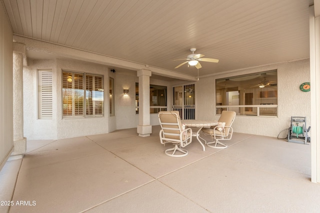 view of patio featuring ceiling fan