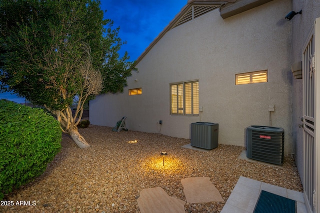 view of property exterior featuring central air condition unit