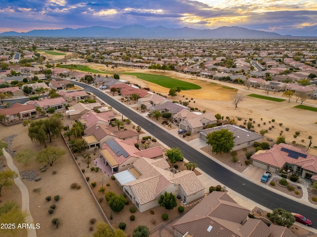 aerial view at dusk with a mountain view