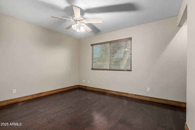 7126 N 19th Ave Unit 228, Phoenix, AZ 85021 - empty room featuring dark wood finished floors and ceiling fan