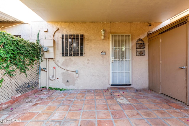7126 N 19th Ave Unit 228, Phoenix, AZ 85021 - entrance to property with stucco siding and a patio area