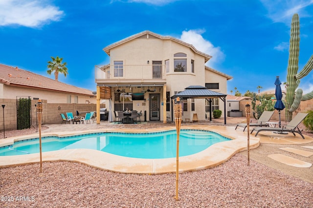 view of pool with a fenced in pool, a patio, a gazebo, a ceiling fan, and a fenced backyard