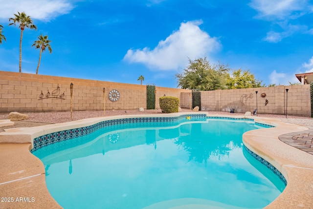 view of pool with a fenced backyard and a fenced in pool