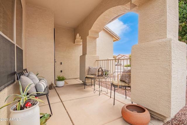 balcony with a patio area