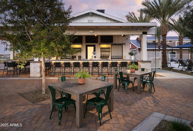 view of patio / terrace with outdoor dining space and fence