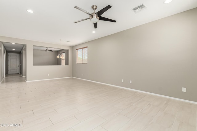 9822 W Caron Dr, Peoria, AZ 85345 - empty room with a ceiling fan, recessed lighting, and baseboards
