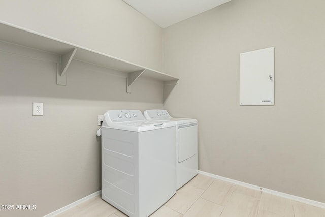 9822 W Caron Dr, Peoria, AZ 85345 - laundry room with washing machine and dryer, baseboards, and electric panel