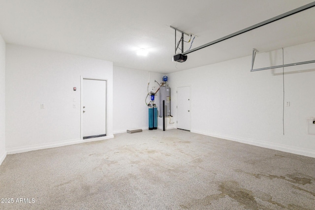 9822 W Caron Dr, Peoria, AZ 85345 - garage with a garage door opener, water heater, and baseboards