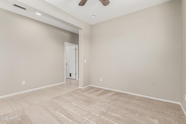 9822 W Caron Dr, Peoria, AZ 85345 - unfurnished room featuring light colored carpet, baseboards, a ceiling fan, and recessed lighting