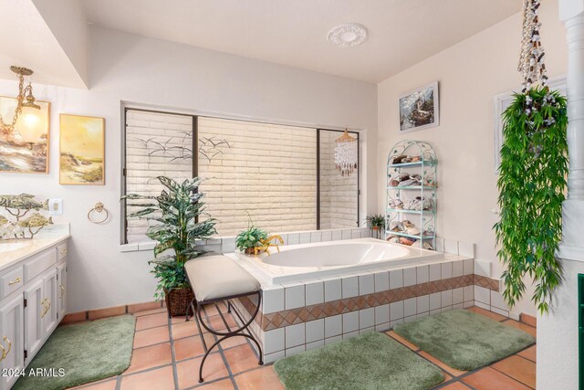 36444 N Stardust Ln, Carefree, AZ 85377 - full bathroom with vanity, a garden tub, and tile patterned floors