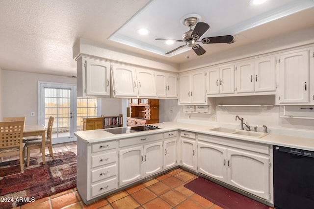 kitchen featuring sink, black appliances, kitchen peninsula, ceiling fan, and white cabinets