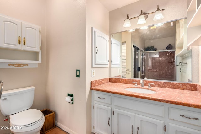 36444 N Stardust Ln, Carefree, AZ 85377 - bathroom featuring a shower stall, vanity, toilet, and baseboards