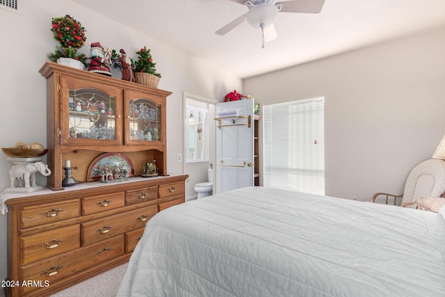 36444 N Stardust Ln, Carefree, AZ 85377 - bedroom with carpet flooring, connected bathroom, and a ceiling fan