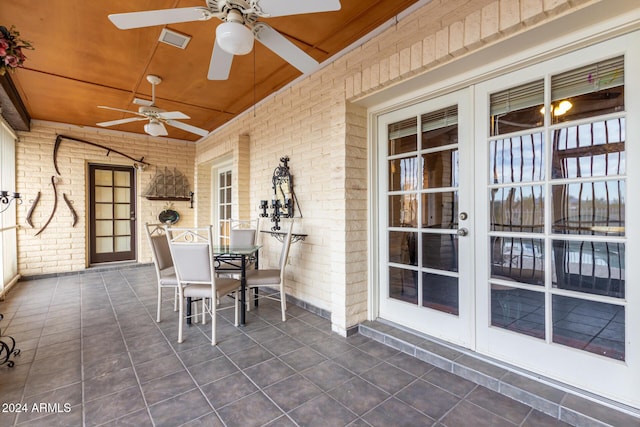 36444 N Stardust Ln, Carefree, AZ 85377 - sunroom featuring french doors, a ceiling fan, and outdoor dining area