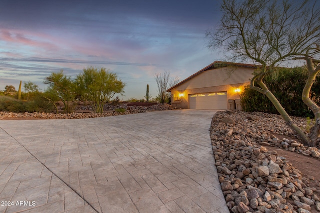 view of front of home with a garage