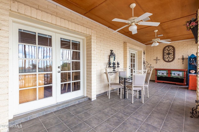 view of patio with french doors and ceiling fan