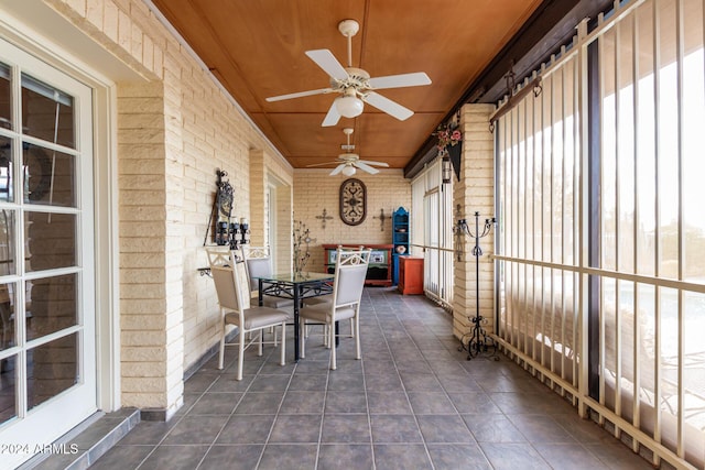 36444 N Stardust Ln, Carefree, AZ 85377 - sunroom / solarium with ceiling fan, healthy amount of natural light, and outdoor dining area