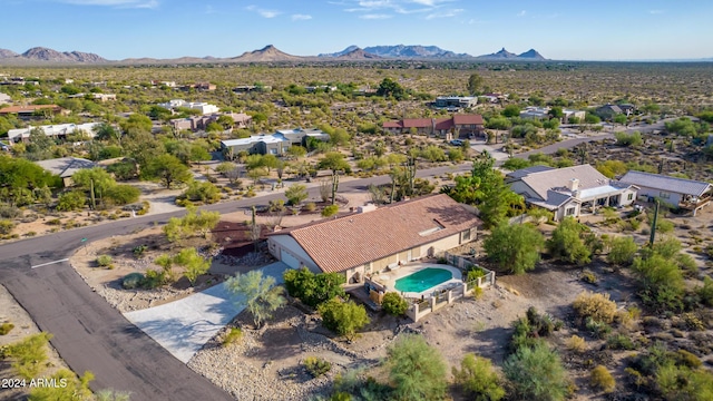36444 N Stardust Ln, Carefree, AZ 85377 - aerial perspective of suburban area featuring a mountain backdrop and a pool area