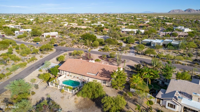 36444 N Stardust Ln, Carefree, AZ 85377 - aerial perspective of suburban area with a mountainous background and a pool area