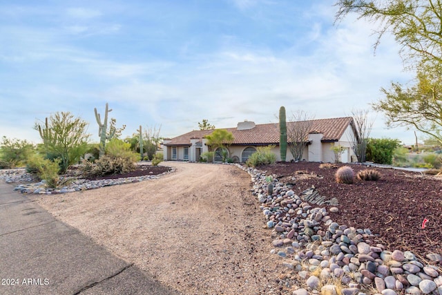 36444 N Stardust Ln, Carefree, AZ 85377 - view of front facade with driveway, a tile roof, stucco siding, and an attached garage