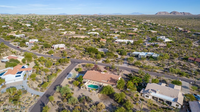 drone / aerial view featuring a mountain view