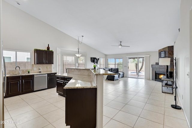 4329 W Electra Ln, Glendale, AZ 85310 - kitchen featuring stainless steel dishwasher, a sink, lofted ceiling, open floor plan, and a ceiling fan