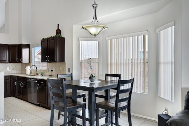4329 W Electra Ln, Glendale, AZ 85310 - dining area featuring light tile patterned floors and a high ceiling