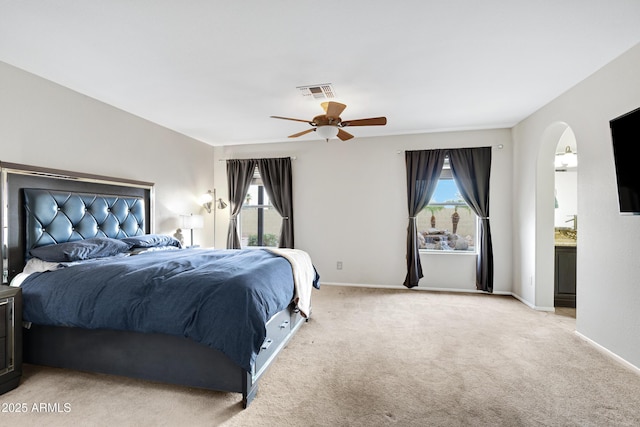 4329 W Electra Ln, Glendale, AZ 85310 - bedroom featuring light colored carpet, multiple windows, and arched walkways