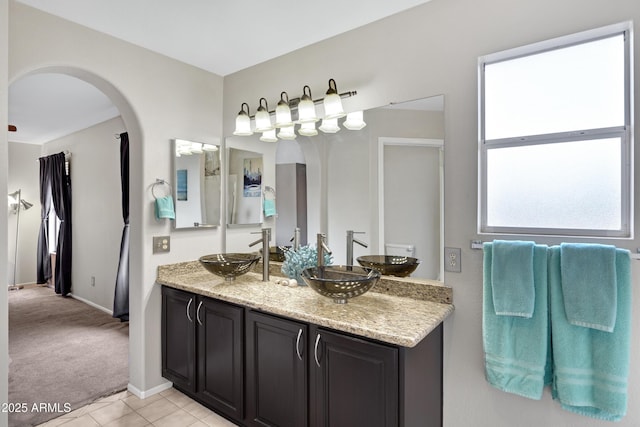 4329 W Electra Ln, Glendale, AZ 85310 - full bath featuring double vanity, baseboards, and tile patterned flooring